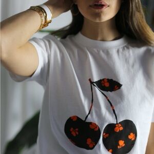 Ganni White Tee with Black and Orange Cherry Design